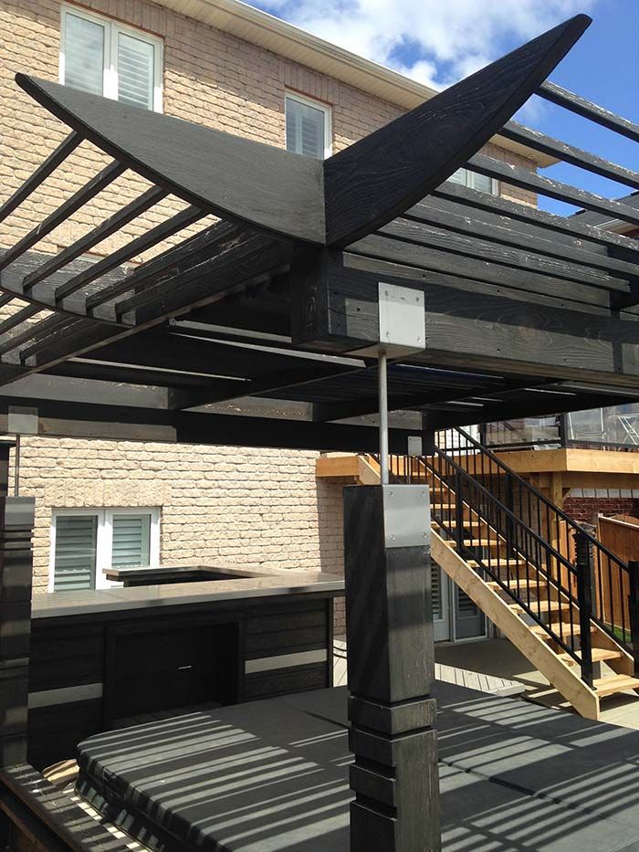 black china style pergola, wooden pergola, hot tub overhead pergola.